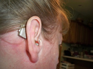 Julie has been wearing hearing aids since the age of five. She writes, 
