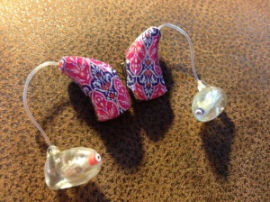 Sarah Lundquist likes  to add color and style to her hearing aids. 